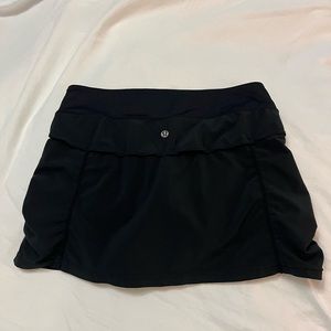 Lululemon black skirt with built in shorts.
